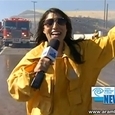 Helicopter Dumps Water Load on Reporter