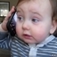 Funny Baby Answers a Phone Call